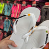 Havaianas Top +  Placa Logo + Pin Sol e Água de Coco