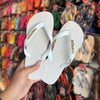 Havaianas Top + Placa Logo Dourado