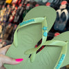 Havaianas Top + Placa Logo + Pin Estrela do Mar + Pin Concha
